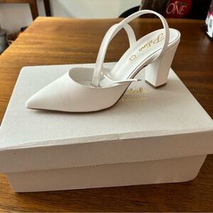 Brand new(never worn) closed toe, pointed, white bridal shoes
